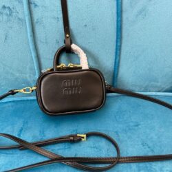 Adorno de piel Miu Miu