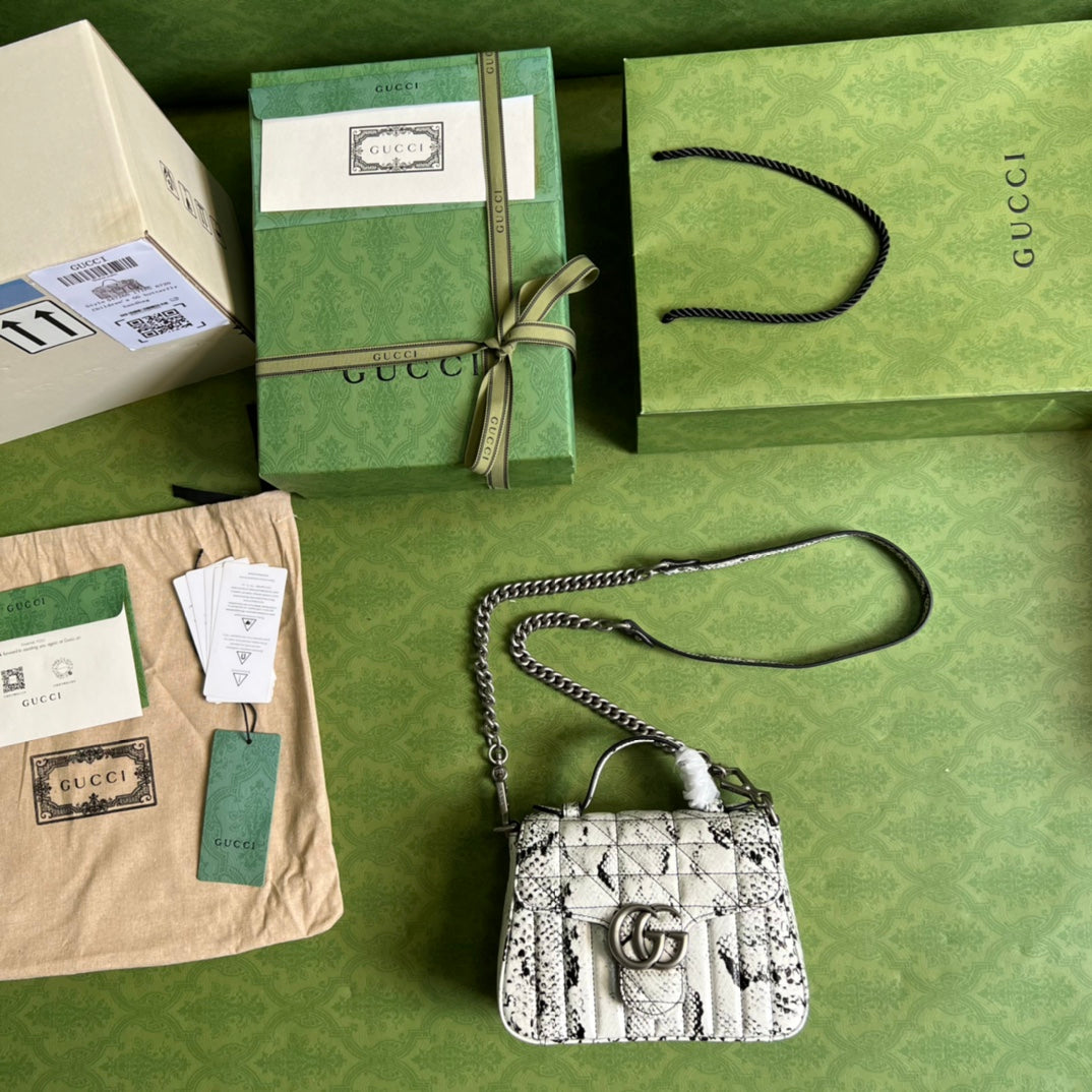 Minibolso GG Marmont de asa superior de pitón Gucci