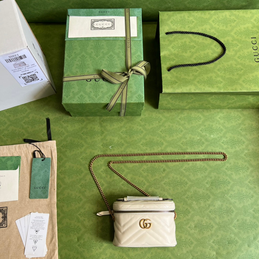 Minibolso de mano GG Marmont Gucci