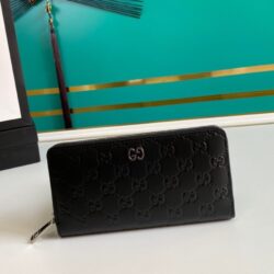 Cartera con cremallera Signature GUCCI