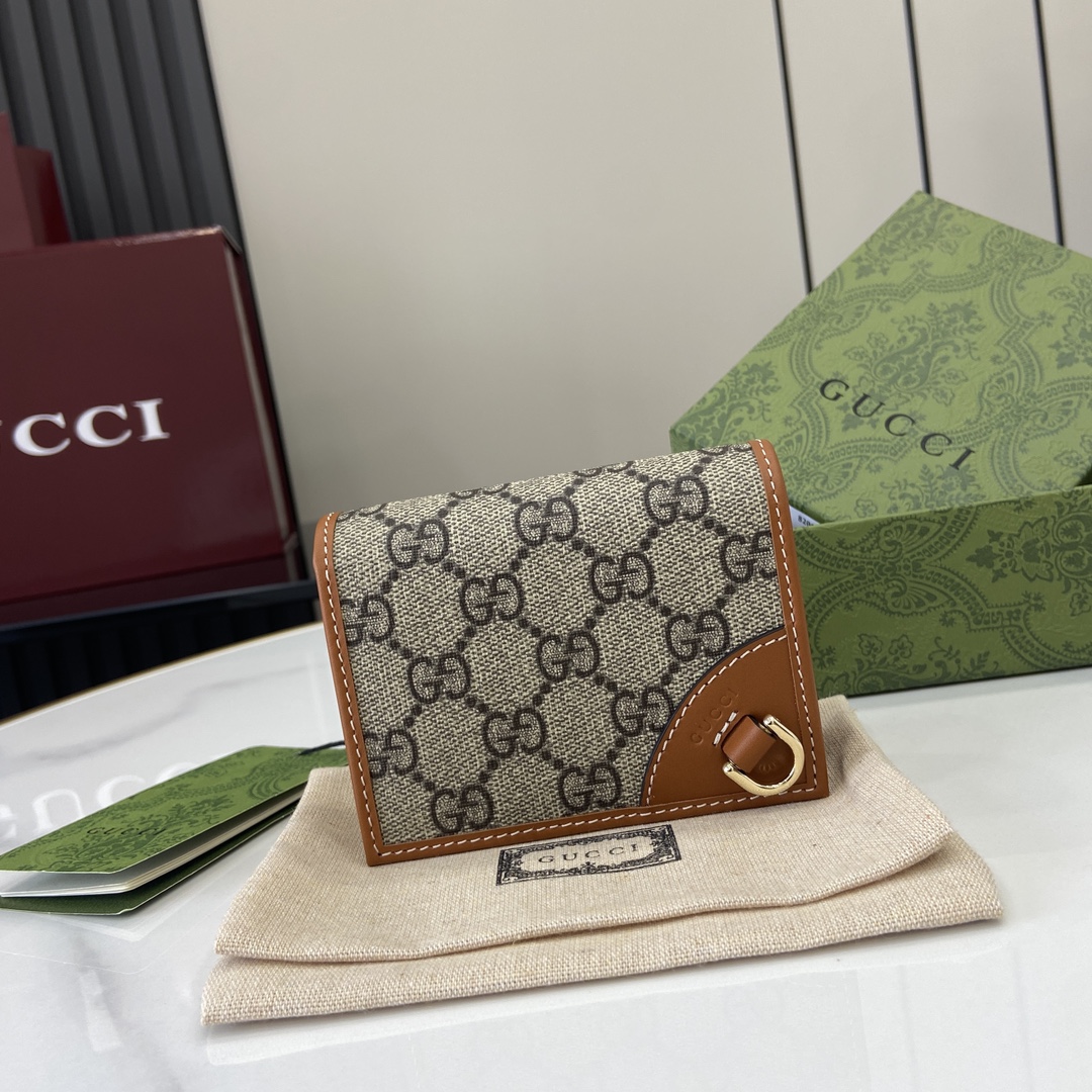 Minicartera GG Emblem Gucci