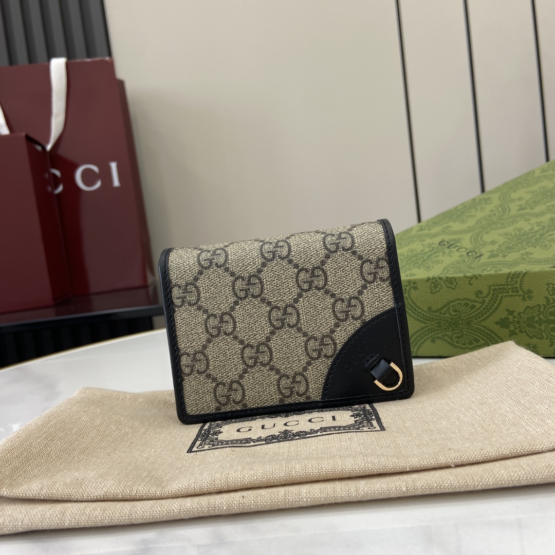 Minicartera GG Emblem Gucci