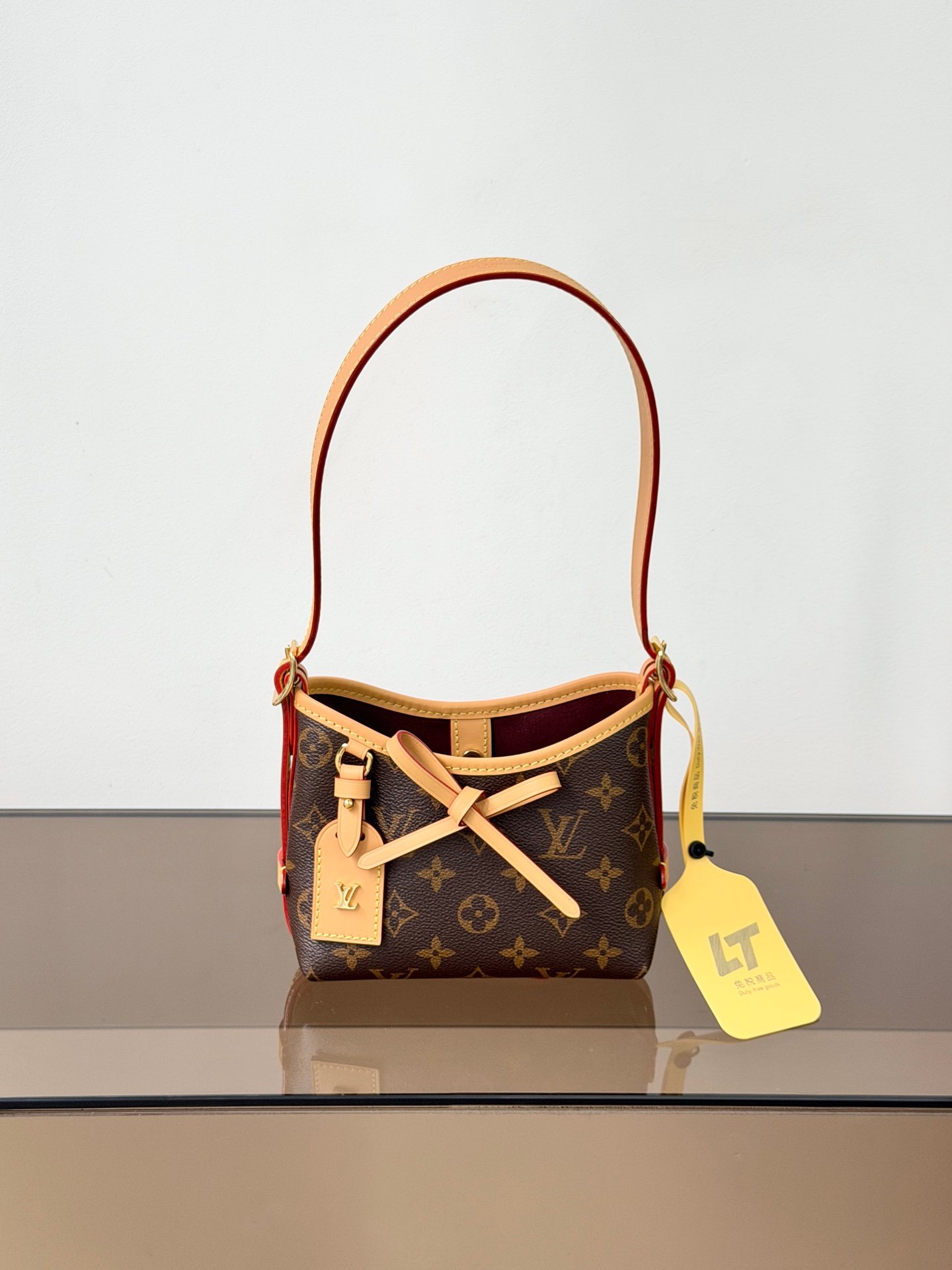 Bolso Nano CarryAll Louis Vuitton