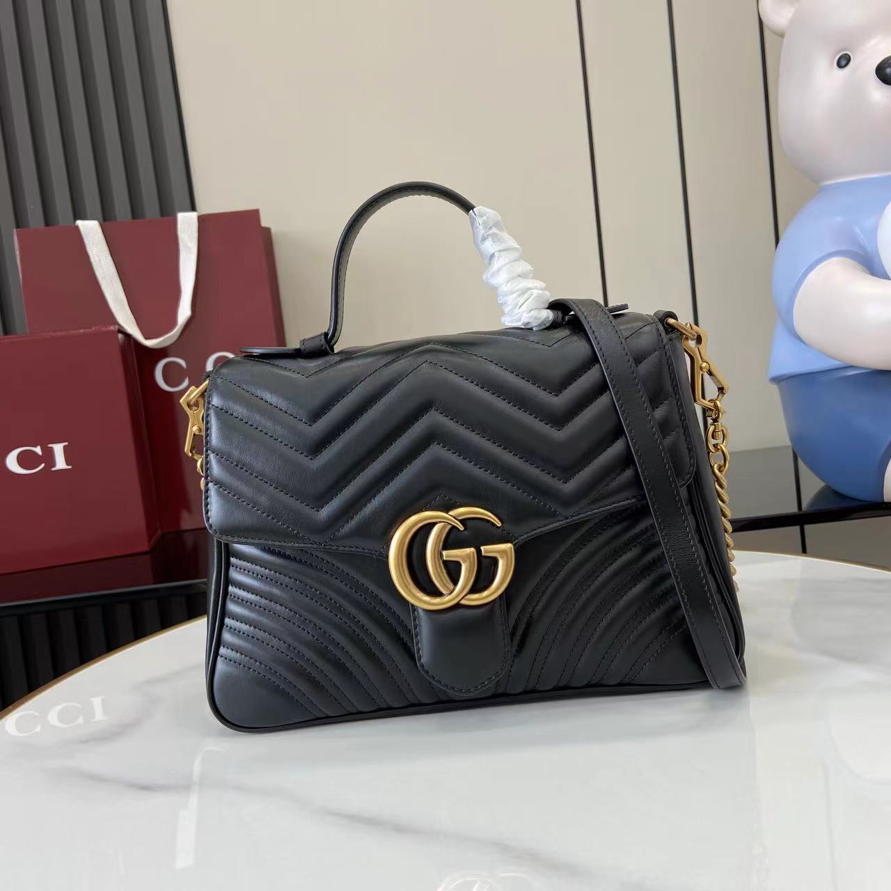 Bolso mano GG Marmont con asa tamaño mediano Gucci
