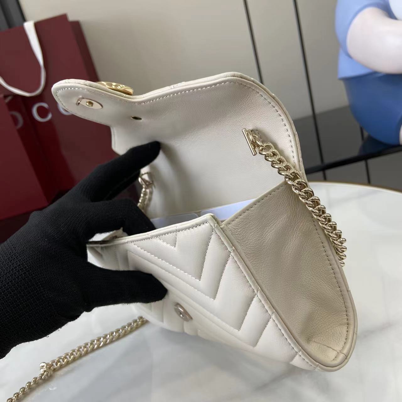 Cartera GG Marmont con cadena Gucci - Imagen 8