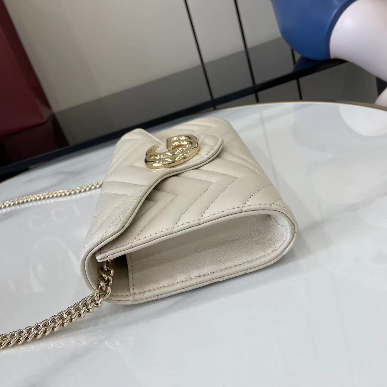 Cartera GG Marmont con cadena Gucci - Imagen 11
