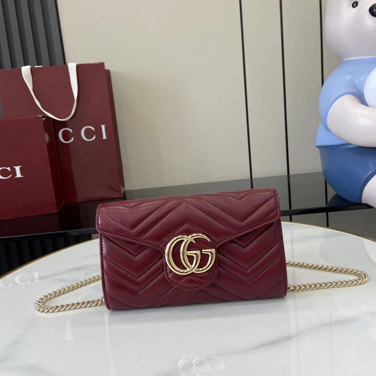 Cartera GG Marmont con cadena Gucci