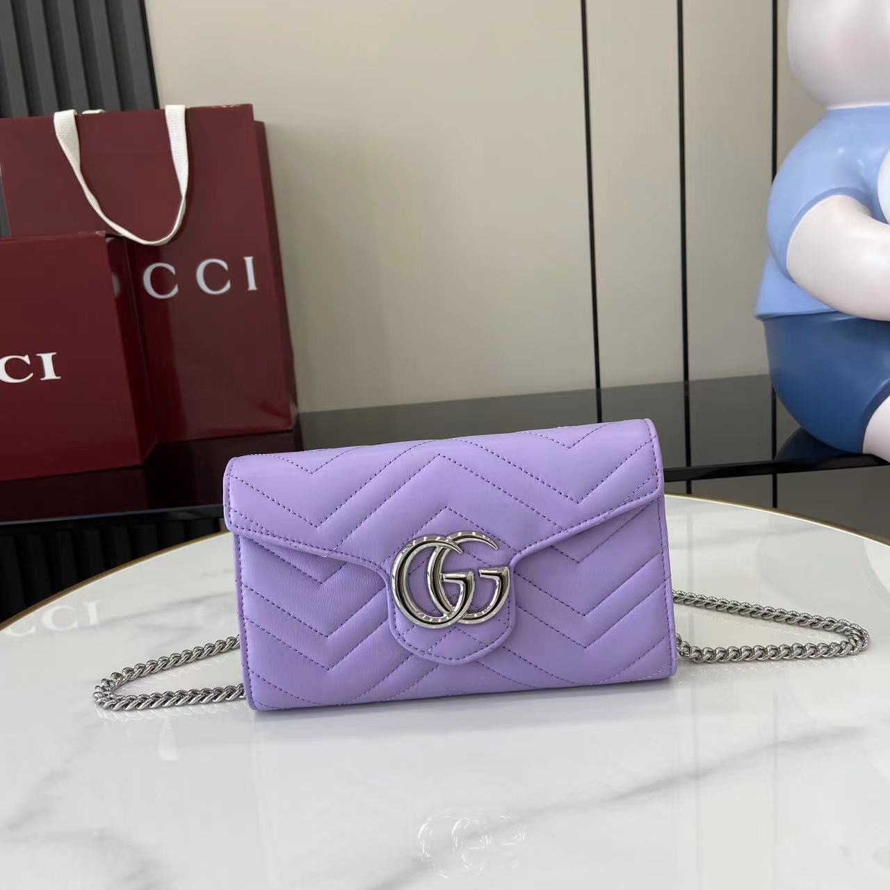 Cartera GG Marmont con cadena Gucci